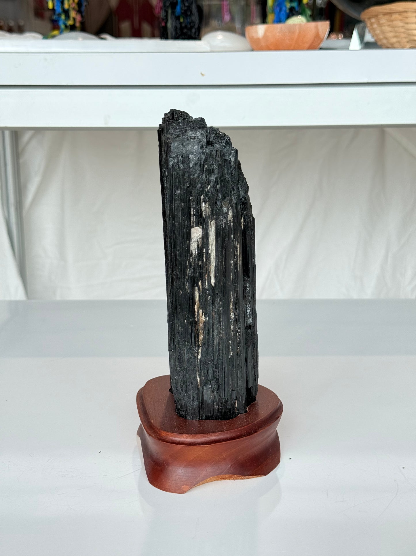 Black Tourmaline On wooden Stand