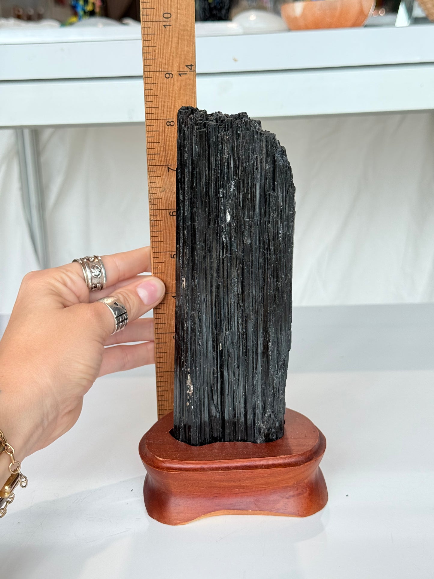Black Tourmaline On wooden Stand