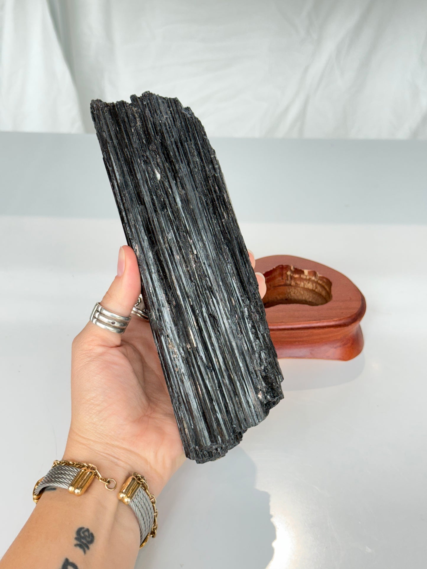 Black Tourmaline On wooden Stand