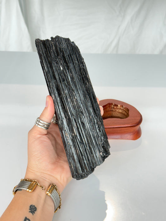 Black Tourmaline On wooden Stand